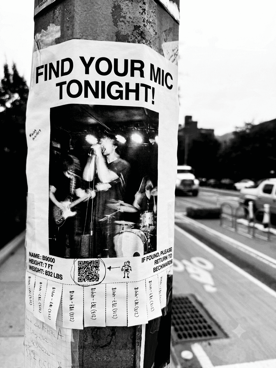A hand-made open mic flyer stapled to a NYC lamppost, reading FIND YOUR MIC TONIGHT, with tear-off tabs along the bottom